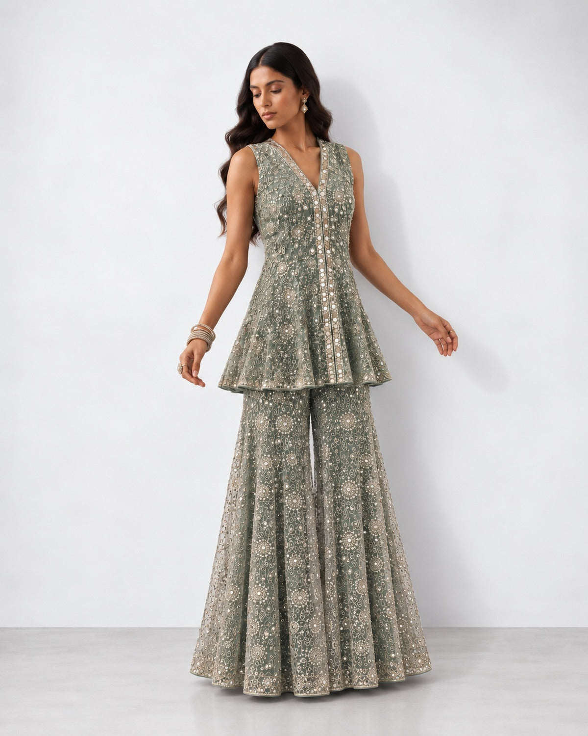 Mint green mirror work peplum top and gharara set, Aina Karée