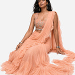 Peach ruffle mirror work saree with net blouse, Aina Karée